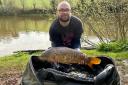 James Barron with a Mirror Carp from Newbarn Angling Centre