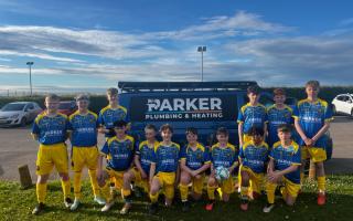 Lympstone U14s presented with their new away kit for next season