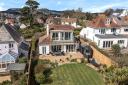 This striking detached property has a garden that measures almost 200 ft in length