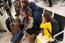 Refugees from Afghanistan arriving on an evacuation flight at Heathrow Airport