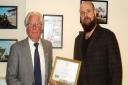 OIB Chairman Brian Nelson presents the certificate to Deputy Mayor, Stewart Lucas
