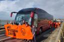 Protesters block the coach arriving to the Bibby Stockholm.Robin Waldren /PA Wire