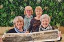 L-R Marjorie Brewer (nee Tomkins) Sue Perryman (nee Coles) Sue Tuthill (nee Spurway) Jane Preece (nee Collins), with a 1964 photo of The King's School pupils