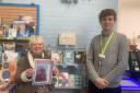 Dot Taylor (left) and friend Janet Lee with Issac from Exmouth Library.