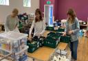 Volunteers at Exmouth Food Bank sorting goods