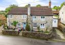The charming four bedroom house sits in the pretty village of Whitford