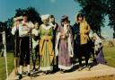 The opening ceremony at the Colyford Goose Fayre in 1979. George Mabon is in blue and yellow and Colin Pady in mauve costume.
