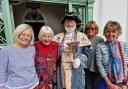 Exmouth town crier Roger Bourgein with, left to right, artists Bente Kumar, June Murrell, Debbie Coles and Zan Nye