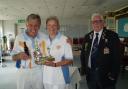 Alan and Lin Halpin, winners of the Nora Goldsmith Trophy for Married Pairs, with Madeira Club President Keith Weeks