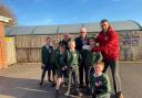 Budleigh Freemasons present a cheque to St Peters School. Credit Budleigh Freemasons.