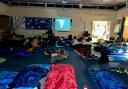 The Beaver Scouts camping in the school hall