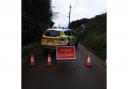Devon and Cornwall Police have closed the road