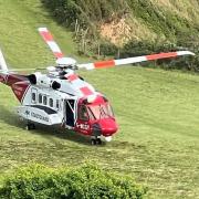 The coastguard helicopter at the scene of the accident