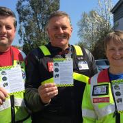 Left to right, Devon Freewheelers volunteer Anthony Ewens, Tony Heywood from DSFRS and charity Blood Biker Emma Pring with the Crash Cards.