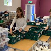 Volunteers at Exmouth Food Bank sorting goods