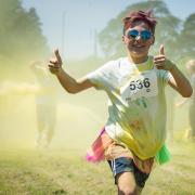 A participant in the Rainbow Run in 2019