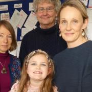 Betsy with Refugee Support Devon chair Jenny Longford, admin assistant Nick Floyd and her mum Gemma.