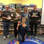 Books were donated to the Budleigh Salterton Library.
