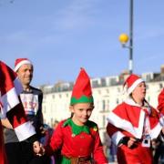 The Age UK Santa Fun Run in Exmouth.