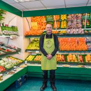 Greengrocer Andrew Beatty in his shop in Budleigh Salterton