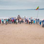 The protest group gathered on Exmouth seafront with placards highlighting the sewage pollution.
