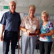 Geoff and Myra Furminger receiving the President’s Award from Jacky Howle