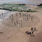 Exmouth Qaukers draw Labyrinth at Orcombe Point