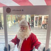 Santa supporting City