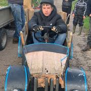 George - an under-17 competitor - trying out a ‘classic’ soap box that has been donated for the event