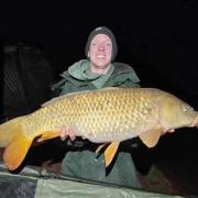 Anthony Andrews with a Common Carp caught from the specimen pool at Newbarn