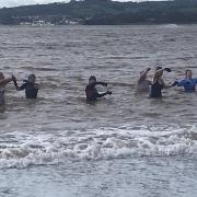 Exercising in the sea off Exmouth beach
