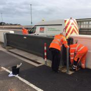 Flood gates being put in place at Exmouth seafront
