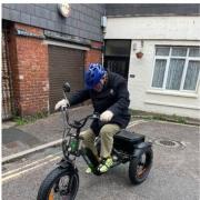 Exmouth Town Crier on his trike which was stolen